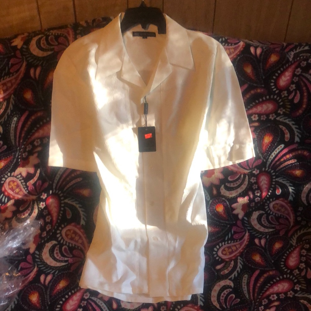 I cream color button and pants outfit. Still band new never worn.
